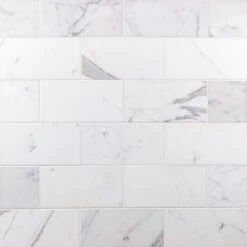 Ivy Hill Tile Calacatta 4 In. X 8 In. X 9mm Polished Marble Subway Tile (25 Pieces / 5.55 Sq. Ft. / Box)
